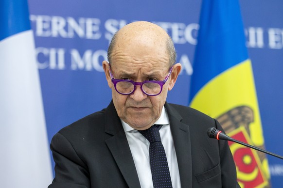 epa09799671 French Foreign Minister Jean-Yves Le Drian during a press conference with the European Commissioner for Humanitarian Aid and Crisis Management (not pictured) and Moldovan Minister of Forei ...