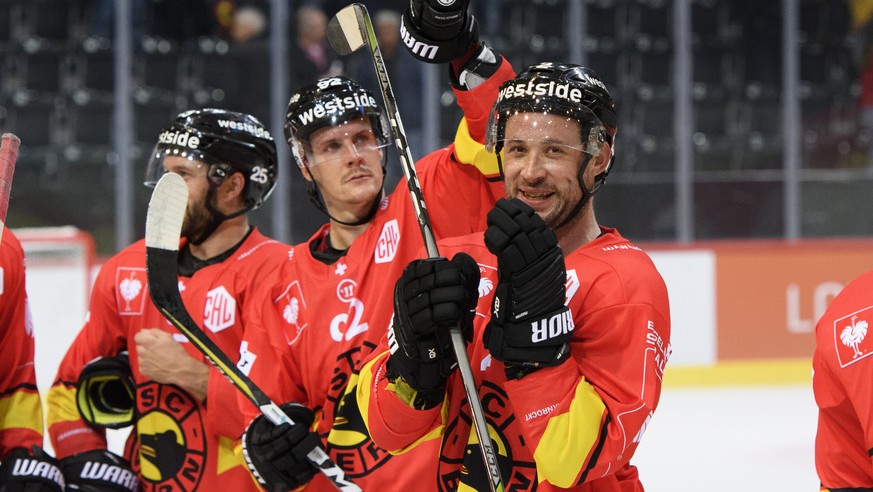 Bern&#039;s Beat Gerber, right, Andrew Ebbett, left, and Gaetan Haas, center, celebrate the victory (4-3) during the Champions Hockey League group G match between Switzerland&#039;s SC Bern and Sweden ...