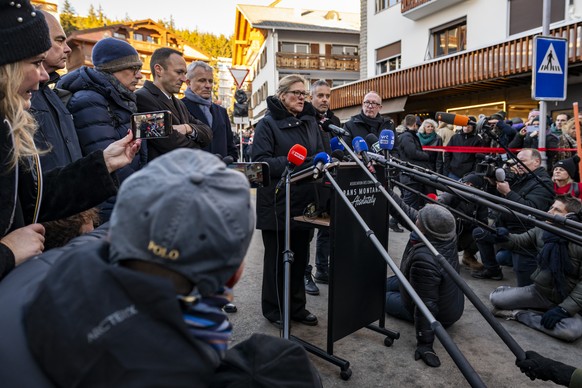 Beatrice Pilloud, center, Attorney General of the Canton of Valais, speaks to the journalists after inspecting the site of the fire at the 'Le Constellation' bar and lounge, in Crans-Montana ...