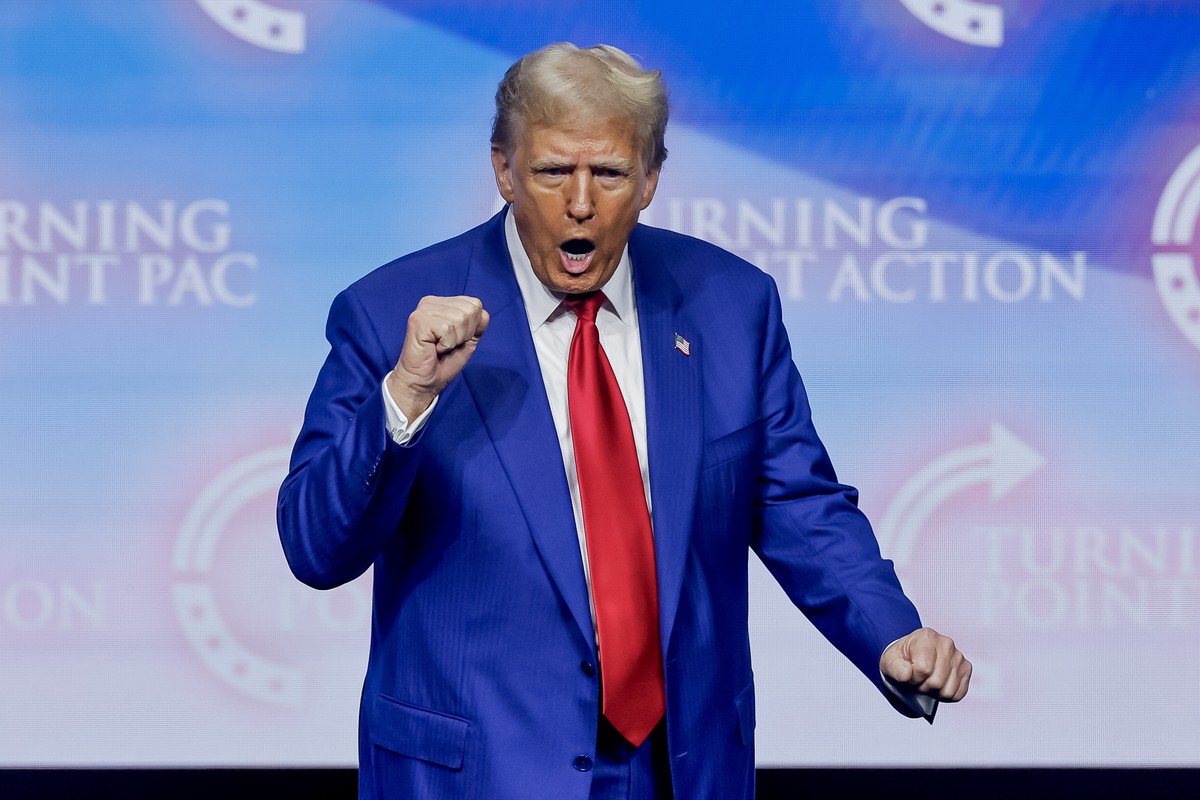 epa11679083 Former US President and Republican presidential nominee Donald Trump speaks at the Turning Point PAC campaign rally at the Gas South Arena, in Duluth, Georgia, USA, 23 October 2024. Trump  ...