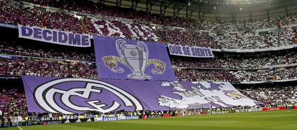 epa05941038 Real Madrid&#039;s fans unfold a banner during the choreo prior the UEFA Champions League semifinal first leg soccer match between Real Madrid and Atletico Madrid at the Santiago Bernabeu  ...
