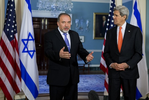 Israeli Foreign Minister Avigdor Liebermann speaks to reporters prior to a meeting with Secretary of State John Kerry, Wednesday, April 9, 2014, at the State Department in Washington. (AP Photo/Manuel ...