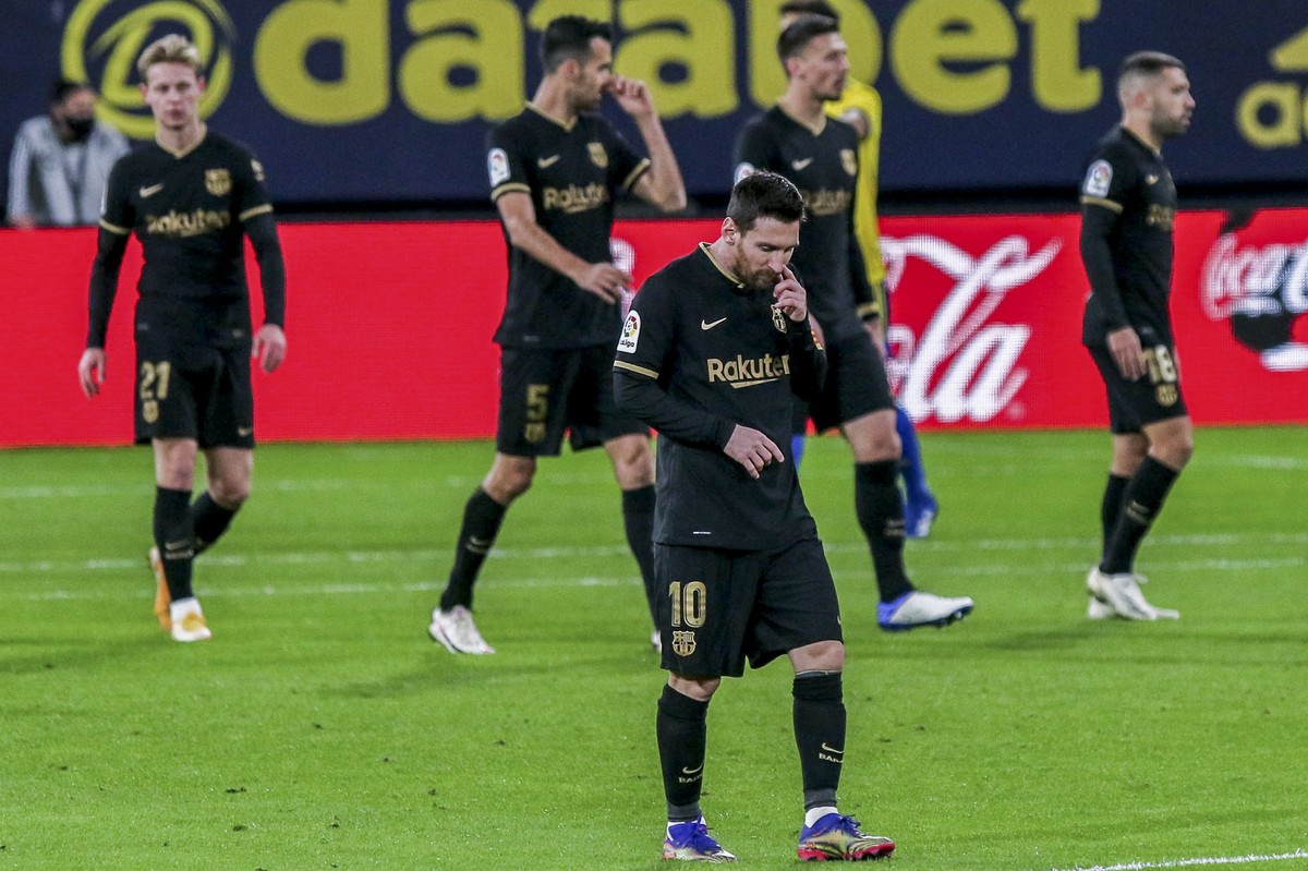 Barcelona's Lionel Messi reacts after Cadiz scored a goal during the Spanish La Liga soccer match between Cadiz and FC Barcelona at the Ramon Carranza stadium in Cadiz, Spain, Saturday Dec. 5, 20 ...