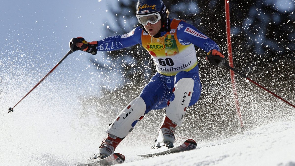 Swiss ski racer Marc Berthod clears a gate in the first run of the men's ski world cup slalom in Adelboden, Switzerland, Sunday, January 7, 2007. Berthod was 27th of the first run but won the rac ...