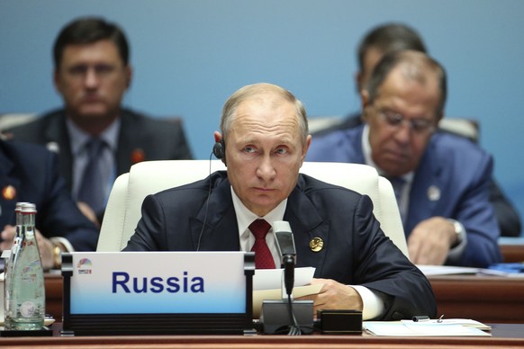 Russian President Vladimir Putin attends the Dialogue of Emerging Market and Developing Countries on the sideline of the BRICS Summit in Xiamen, China, Sept. 5, 2017. (Wu Hong/Pool Photo via AP)