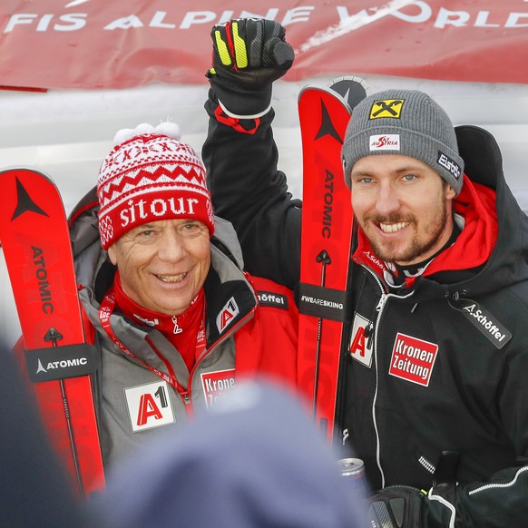 epa07377315 Marcel Hirscher of Austria (R) celebrates with Peter Schroecksnadel, President of the Austrian Ski Federation, after winning the Men's Slalom race at the 2019 FIS Alpine Skiing World Champ ...