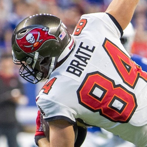 November 28, 2021: Tampa Bay Buccaneers tight end Cameron Brate 84gets tripped up by Indianapolis Colts defensive back George Odum 30 during NFL, American Football Herren, USA football game action bet ...