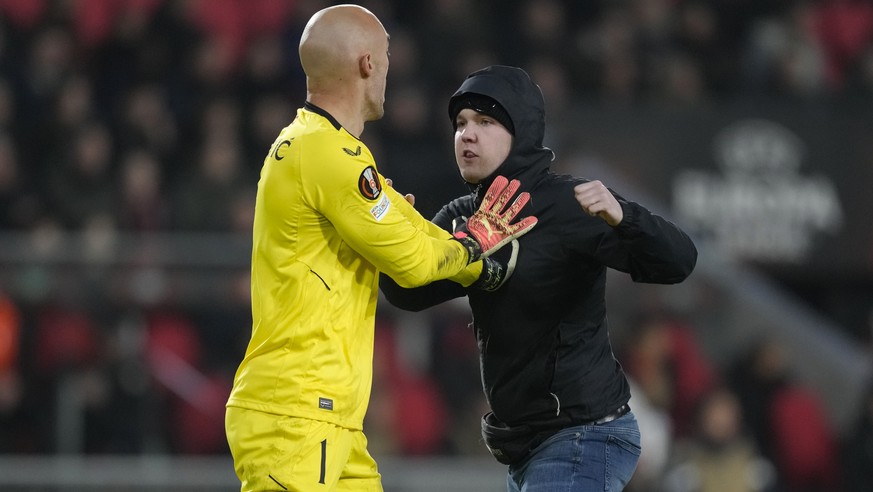 PSV fan attacks Sevilla goalkeeper Marko Dimitrovic