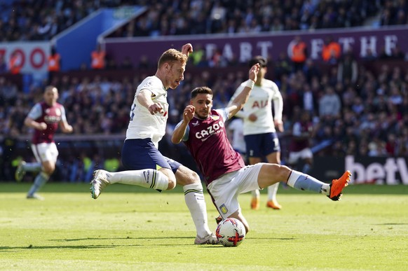 Tottenham&#039;s Dejan Kulusevski, left, and Aston Villa&#039;s Alex Moreno battle for the ball during the English Premier League soccer match between Aston Villa and Tottenham at Villa Park, Birmingh ...