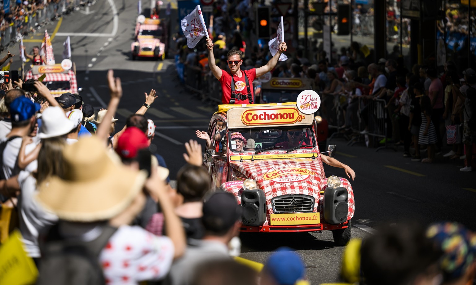 The advertising caravan is on the road during the 8th stage of the Tour de France 2022 over 186,3 km from Dole in France to Lausanne in Switzerland, in Lausanne, Switzerland, Saturday, July 9, 2022. ( ...