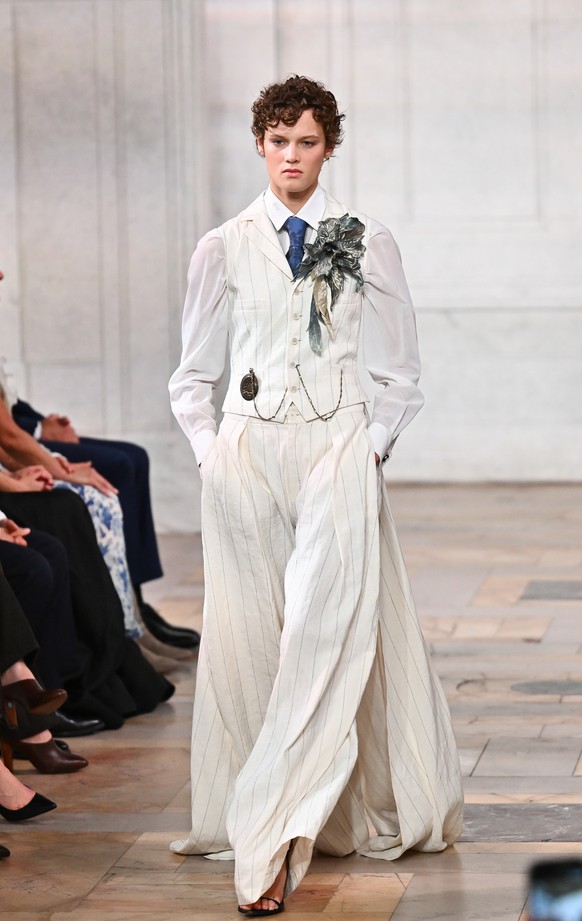 A model walks the runway during the Ralph Lauren Spring/Summer 2027 presentation as part of New York Fashion Week on Wednesday, Sept. 9, 2026, in New York. (Photo by Evan Agostini/Invision/AP)
NYFW -  ...