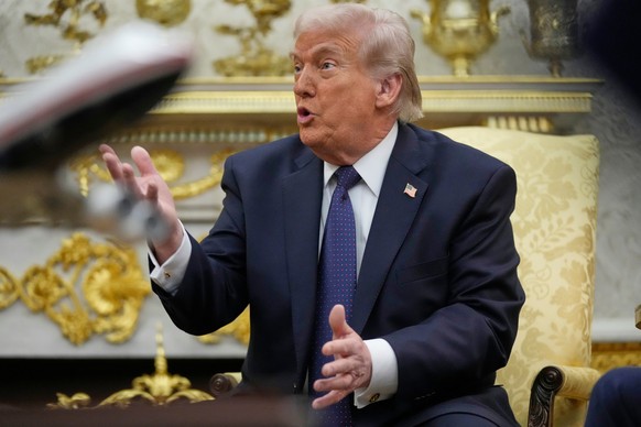 President Donald Trump speaks during a meeting with German Chancellor Friedrich Merz in the Oval Office at the White House, Tuesday, March 3, 2026, in Washington. (AP Photo/Mark Schiefelbein)
Donald T ...
