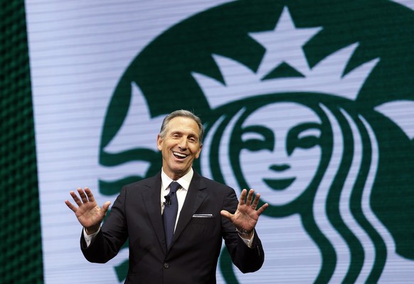 FILE - In this March 22, 2017 file photo, Starbucks CEO Howard Schultz speaks at the Starbucks annual shareholders meeting in Seattle. Schultz spent more than 30 years at Starbucks, growing a handful  ...