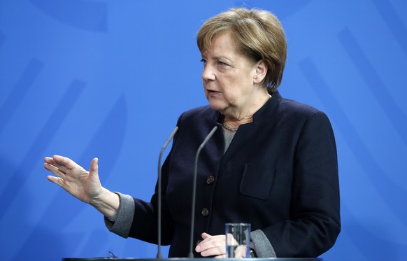 epa05861712 German Chancellor Angela Merkel speaks next to Burkina Faso&#039;s President Roch Marc Kabore (not pictured) during their joint press conference in the Chancellery in Berlin, Germany, 21 M ...