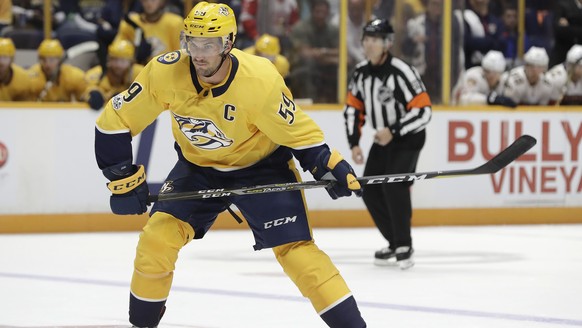 Nashville Predators defenseman Roman Josi, of Switzerland, winds up to shoot against the Florida Panthers during the second period of the second game in an NHL hockey preseason doubleheader Tuesday, S ...