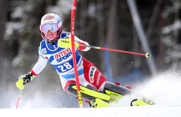 epa05088274 Charlotte Chable of Switzerland in action during the first run of the women's Slalom race of the FIS Alpine Skiing World Cup in Santa Caterina, Italy, 05 January 2016. EPA/MATTEO BAZZ ...