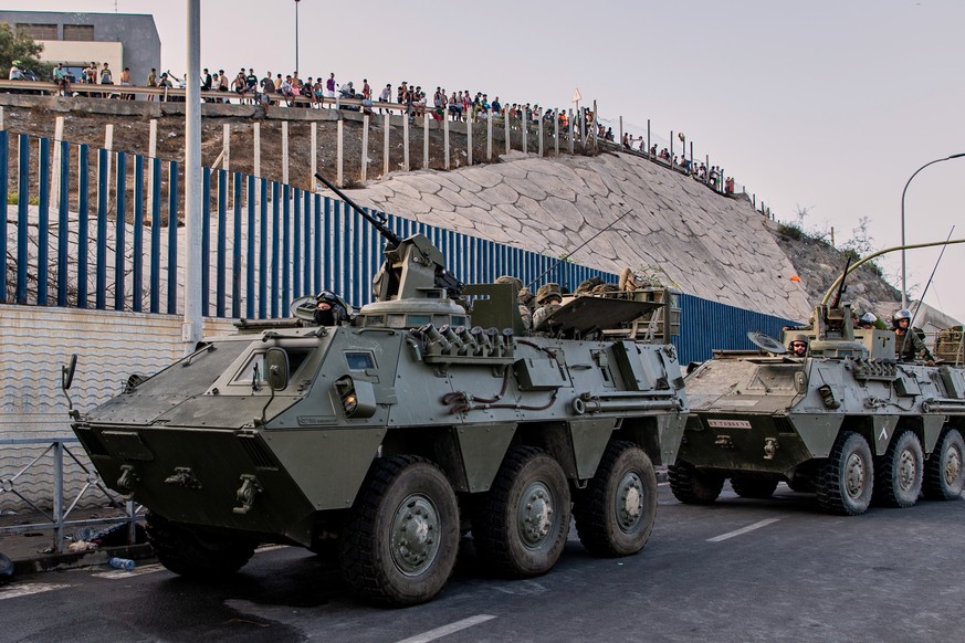Spanish army soldiers travel in military vehicles after being deployed to the Spanish enclave of Ceuta, Thursday, July 30, 2026. (AP Photo/Antonio Sempere)
Spain Ceuta