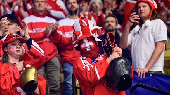 Swiss fans with bells are seen during the 2025 IIHF Ice hockey, Eishockey World Championship, WM, Weltmeisterschaft Group B, match USA vs Switzerland, in Herning, Denmark, May 12, 2025. CTKxPhoto/Vitx ...