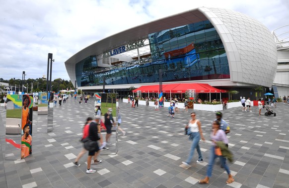 epa09690279 Spectators are seen outside of Rod Laver Arena on Day 1 of the Australian Open tennis tournament, at Melbourne Park, in Melbourne, Australia, 17 January 2022. EPA/JAMES ROSS AUSTRALIA AND  ...