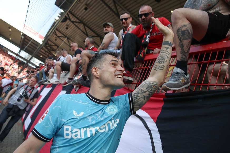 06.04.2024, xtgx, Fussball 1.Bundesliga - 1.FC Union Berlin - Bayer 04 Leverkusen emspor, v.l. Granit Xhaka Leverkusen, 34 Jubel ueber den Sieg, Jubel nach Spielende DFL/DFB REGULATIONS PROHIBIT ANY U ...