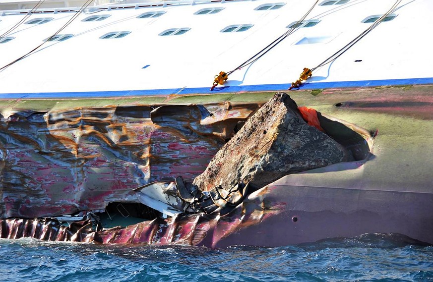 epa09680232 (FILE) - A close up of the Costa Concordia cruise ship listing off the island of Giglio, northern Italy, early 14 January 2012, after she ran ground in the early hours (reissued 12 January ...