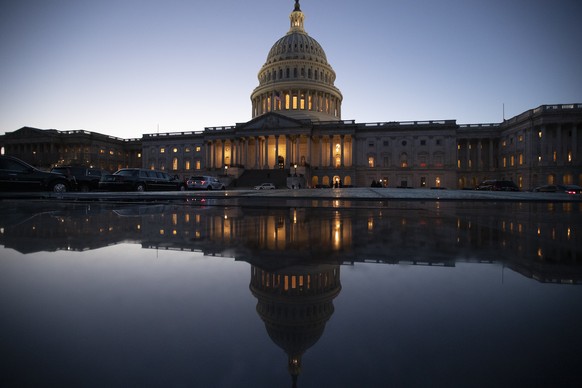 The Capitol is seen at day&#039;s end as the Senate works on a House-passed bill that would pay for President Donald Trump&#039;s border wall and avert a partial government shutdown, at the Capitol in ...