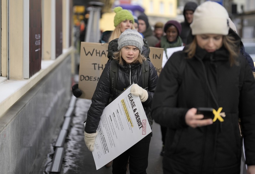 Climate activist Greta Thunberg of Sweden marches at a climate protest outside the World Economic Forum in Davos, Switzerland Friday, Jan. 20, 2023. The annual meeting of the World Economic Forum is t ...