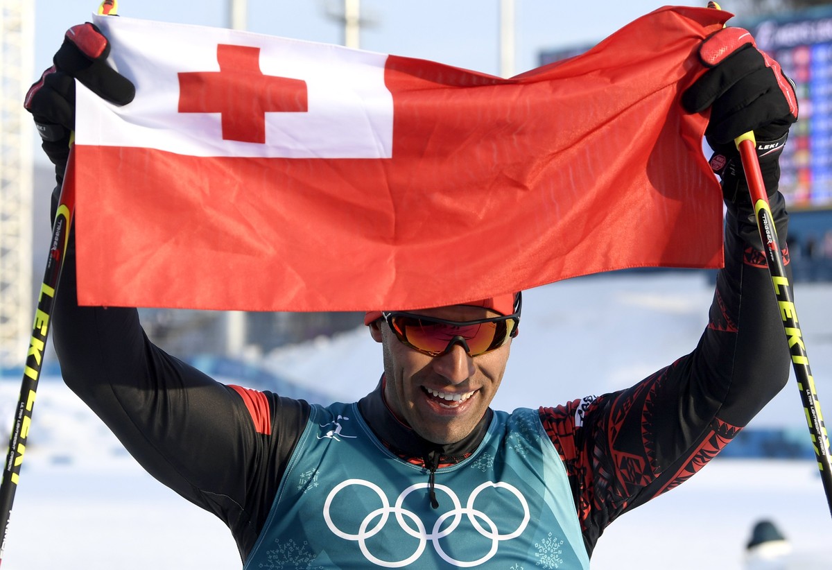 epa06531585 Pita Taufatofua of Tonga reacts after Men's Cross Country 15 km Free race at the Alpensia Cross Country Centre during the PyeongChang 2018 Olympic Games, South Korea, 16 February 2018 ...