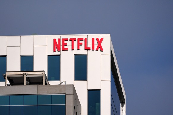 A Netflix sign is displayed atop a building in Los Angeles, Wednesday, Dec. 17, 2025. (AP Photo/Jae C. Hong)
Warner Bros