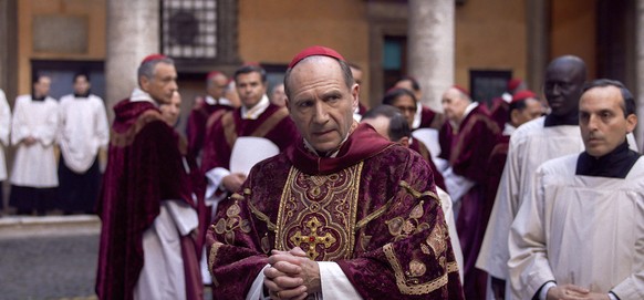This image released by Focus Features shows Ralph Fiennes in a scene from &quot;Conclave.&quot; (Focus Features via AP)