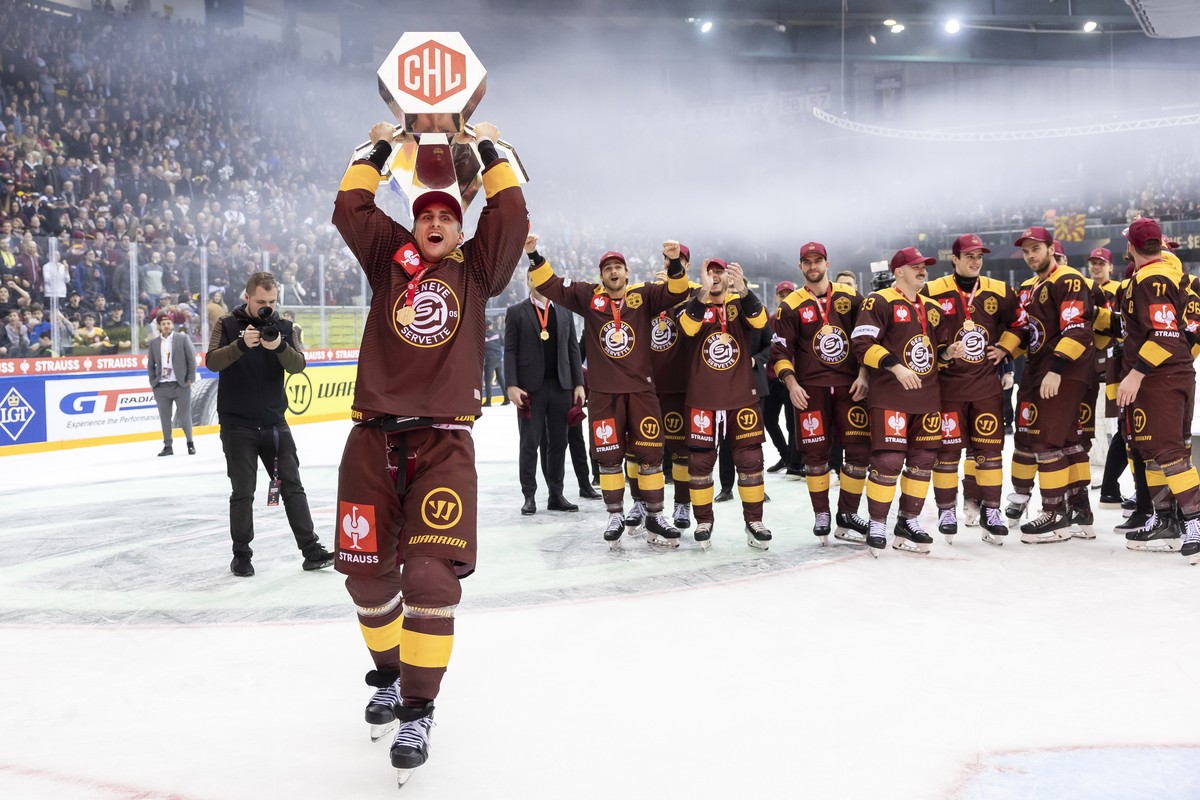 epa11168894 Geneve-Servette's forward Valtteri Filppula lifts the trophy after winning the Champions Hockey League, at the Champions Hockey League Final game between Switzerland's Geneve-Ser ...