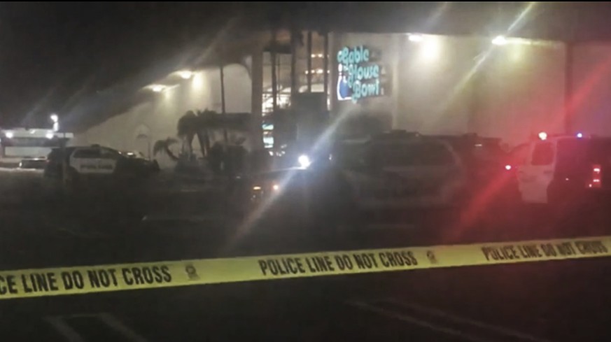 Police rope off the scene of a shooting at a bowling alley in Torrance, Calif., early Saturday, Jan. 5, 2019. The Torrance Police Department responded to calls of &quot;shots fired&quot; at the Gable  ...