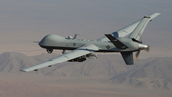 In this undated handout file photo provided by the U.S. Air Force, a MQ-9 Reaper, armed with GBU-12 Paveway II laser guided munitions and AGM-114 Hellfire missiles, is piloted by Col. Lex Turner durin ...