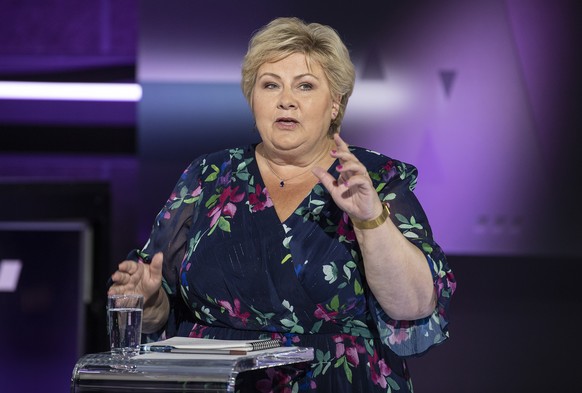 FILE - In this Tuesday, Aug. 31, 2021 file photo, Norwegian Prime Minister and Conservative Party leader Erna Solberg speaks during the party leader debate on TV2, in Bergen, Norway. As Norwegians hea ...