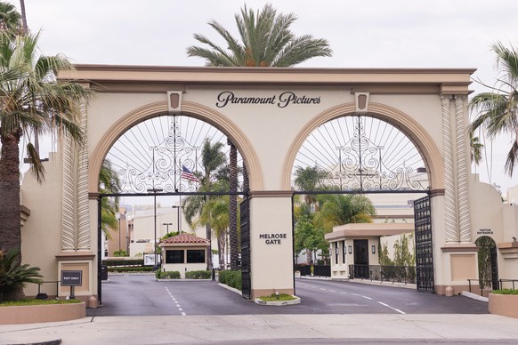 epa13109378 The Melrose Avenue entrance gate to Paramount Studios is seen in Los Angeles, California, USA, 13 July 2026. A coalition of 12 US states filed a lawsuit seeking to block Paramount Skydance ...