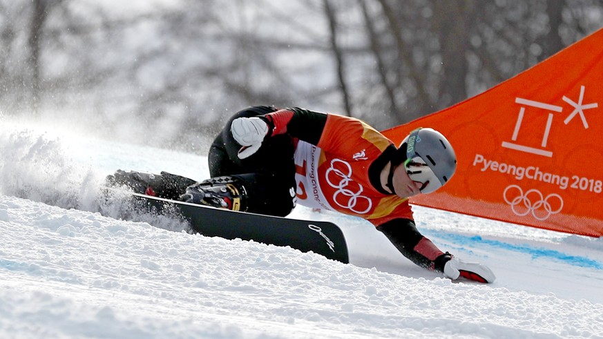 epa06559766 Nevin Galmarini of Switzerland in action during the Men&#039;s Snowboard Parallel Giant Slalom (PGS) Big Final at the Bokwang Phoenix Park during the PyeongChang 2018 Olympic Games, South  ...