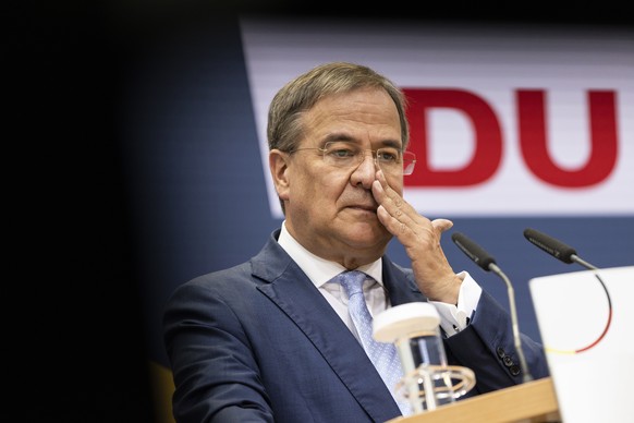 epa09491563 Armin Laschet, chancellor candidate of the Christian Democrats (CDU/CSU) union, at the press conference at CDU headquarters the day after federal elections, in Berlin, Germany, 27 Septembe ...