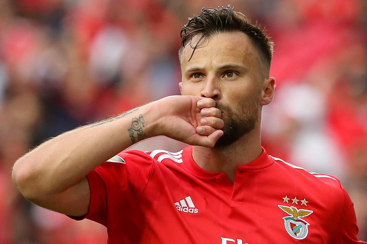 epa07582363 Benfica's Haris Seferovic celebrates after scoring a goal against Santa Clara during their Portuguese First League soccer match held at Luz Stadium in Lisbon, Portugal, 18 May 2019. E ...