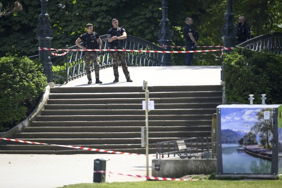 CORRECTS SLUG - Security forces gather at the scene of knife attack in Annecy, French Alps, Thursday, June 8, 2023. An attacker with a knife stabbed several young children and at least one adult, leav ...
