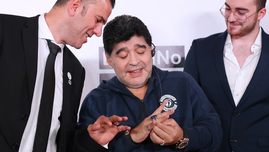epa06893338 Argentinian soccer legend Diego Maradona (C) attends a press conference in Brest, Belarus, 16 July 2018. Maradona has been appointed as chairman of Belarussian soccer club &#039;Dinamo Bre ...