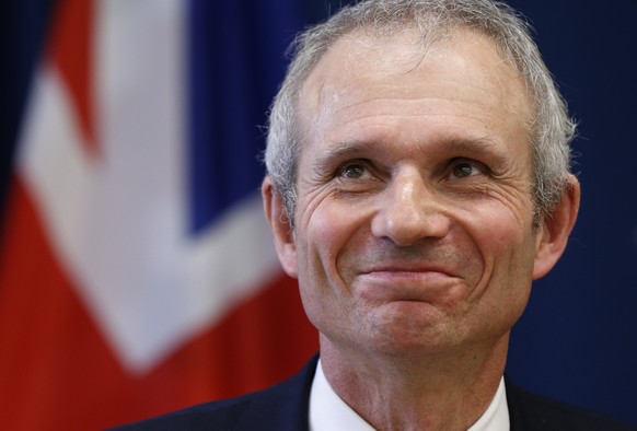 British minister for Europe David Lidington smiles during a meeting with the press, after meeting with Lithuania's Foreign Minister Linas Linkevicius in Vilnius, Lithuania, Tuesday, March 25, 2014. (A ...