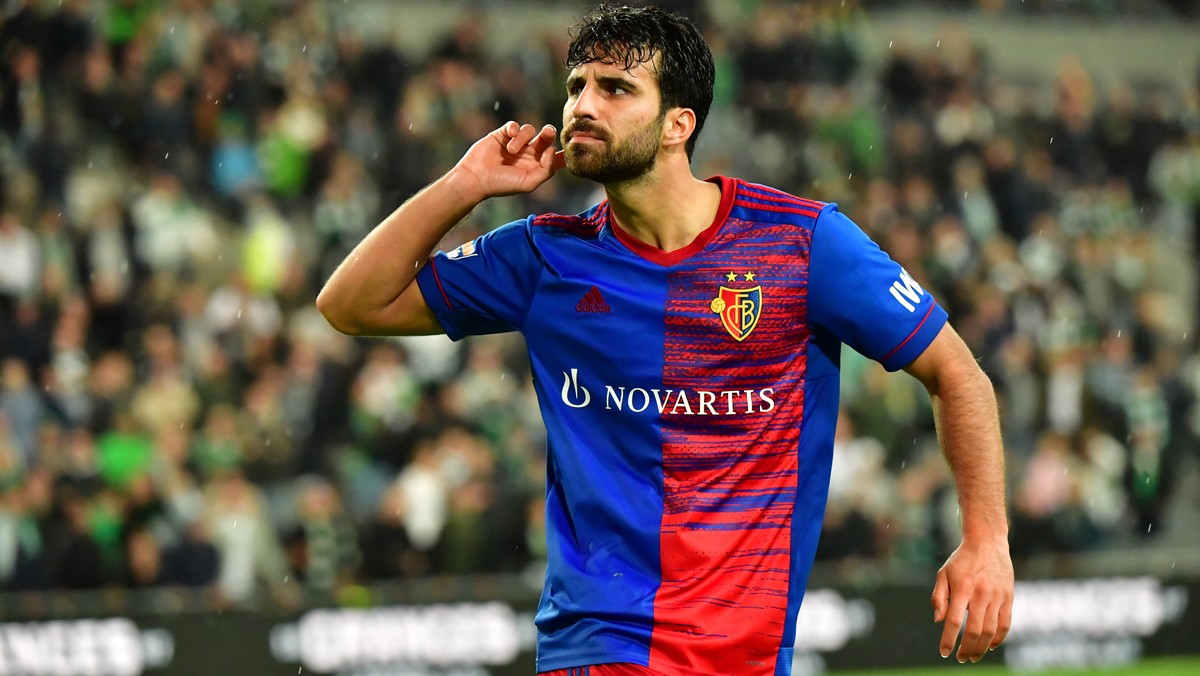 epa09431211 Basel's Eray Comert celebrates scoring during the penalty shootout of the UEFA Conference League second leg play-offs soccer match between Hammarby IF and FC Basel at Tele2 Arena in S ...