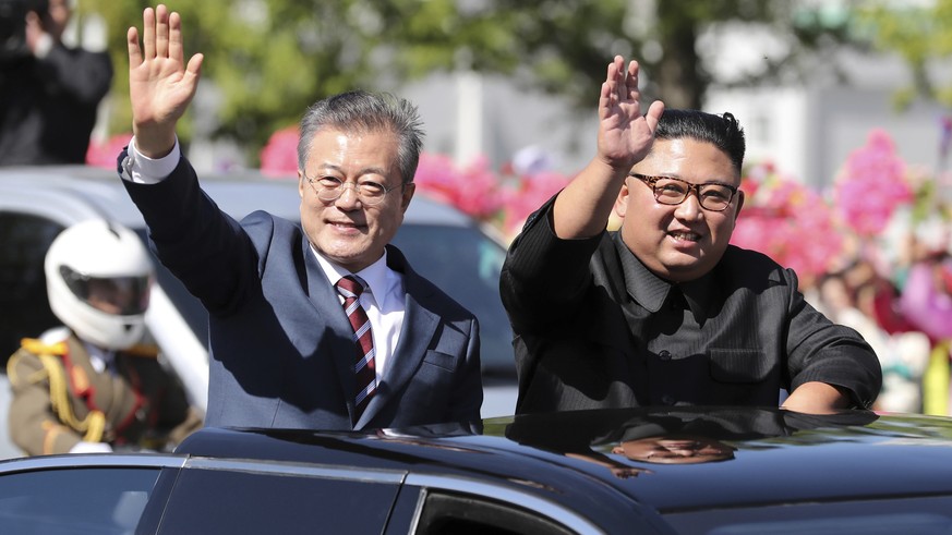 FILE- In this Sept. 18, 2018 file photo, South Korean President Moon Jae-in, left, and North Korean leader Kim Jong Un ride in a car parade through Pyongyang in North Korea. Kim and Moon announced in  ...