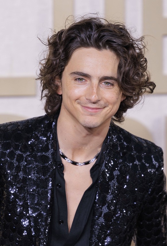 January 7, 2024, Beverly Hills, California, USA: Timothee Chalamet on the red carpet of the 81st Annual Golden Globe Awards on Sunday January 7, 2024 at The Beverly Hilton Hotel in Beverly Hills, Cali ...