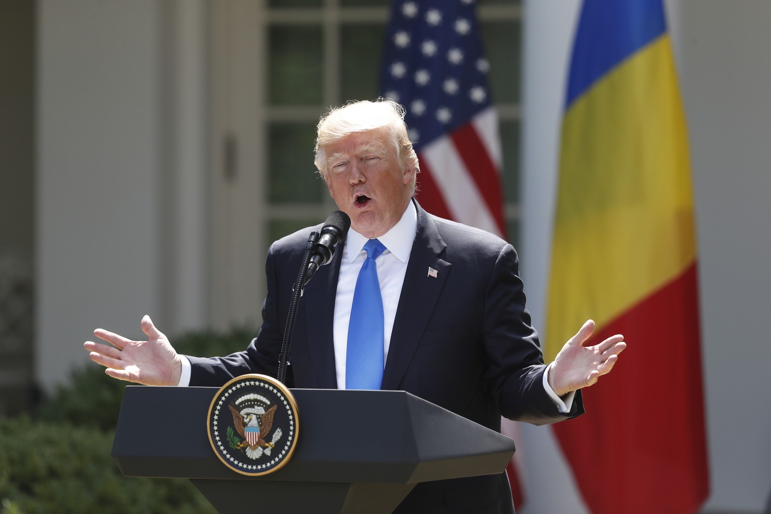 President Donald Trump with Romanian President Klaus Werner Iohannis, speaks during their joint news conference in the Rose Garden of the White House in Washington, Friday, June 9, 2017. (AP Photo/Pab ...