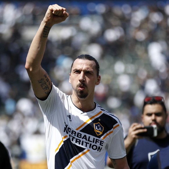 FILE - In this March 31, 2018 file photo Los Angeles Galaxy&#039;s Zlatan Ibrahimovic, of Sweden, acknowledges fans as he walks off the field after an MLS soccer match against the Los Angeles FC in Ca ...