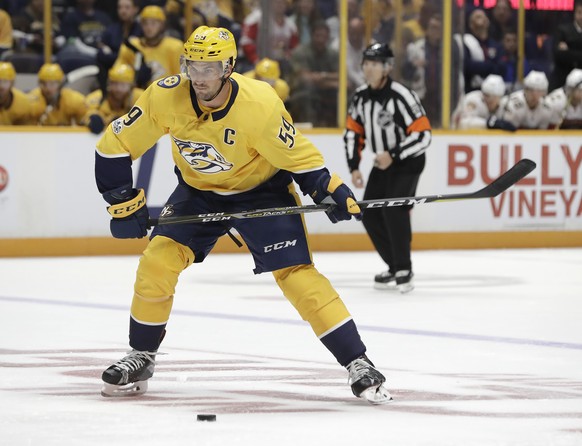 Nashville Predators defenseman Roman Josi, of Switzerland, winds up to shoot against the Florida Panthers during the second period of the second game in an NHL hockey preseason doubleheader Tuesday, S ...