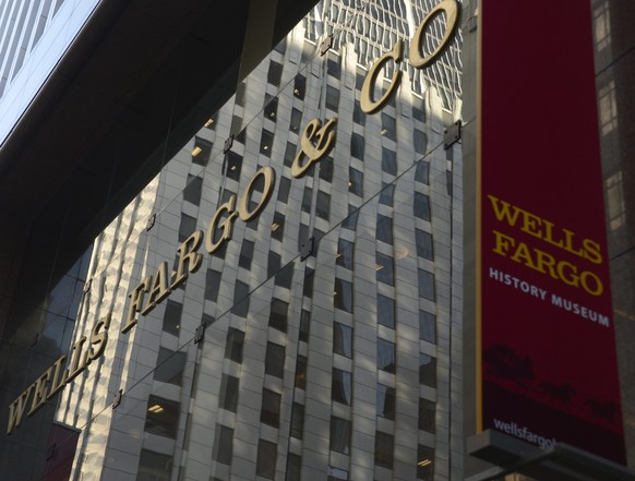 epa04020720 (FILE) A file photo dated 17 January 2013 showing Wells Fargo Bank branch connected to the Wells Fargo Bank and Company headquarters in San Francisco, California, USA. Wells Fargo &amp; Co ...