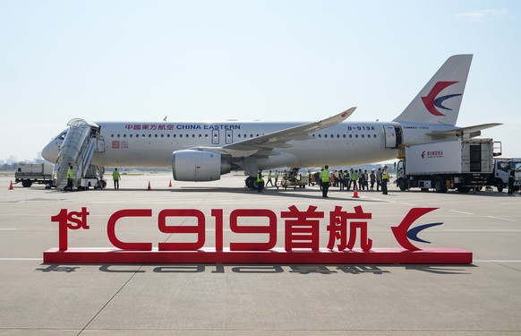 epa10659578 A view of the C919, China&#039;s self-developed large passenger aircraft, getting ready for its first commercial flight in Shanghai, China, 28 may 2023. C919 kicked off its first commercia ...