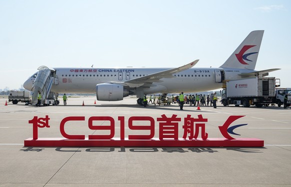 epa10659578 A view of the C919, China's self-developed large airliner, as it prepares for its first commercial flight in Shanghai, China, May 28, 2023. The C919 kicked off its first commercial flight...